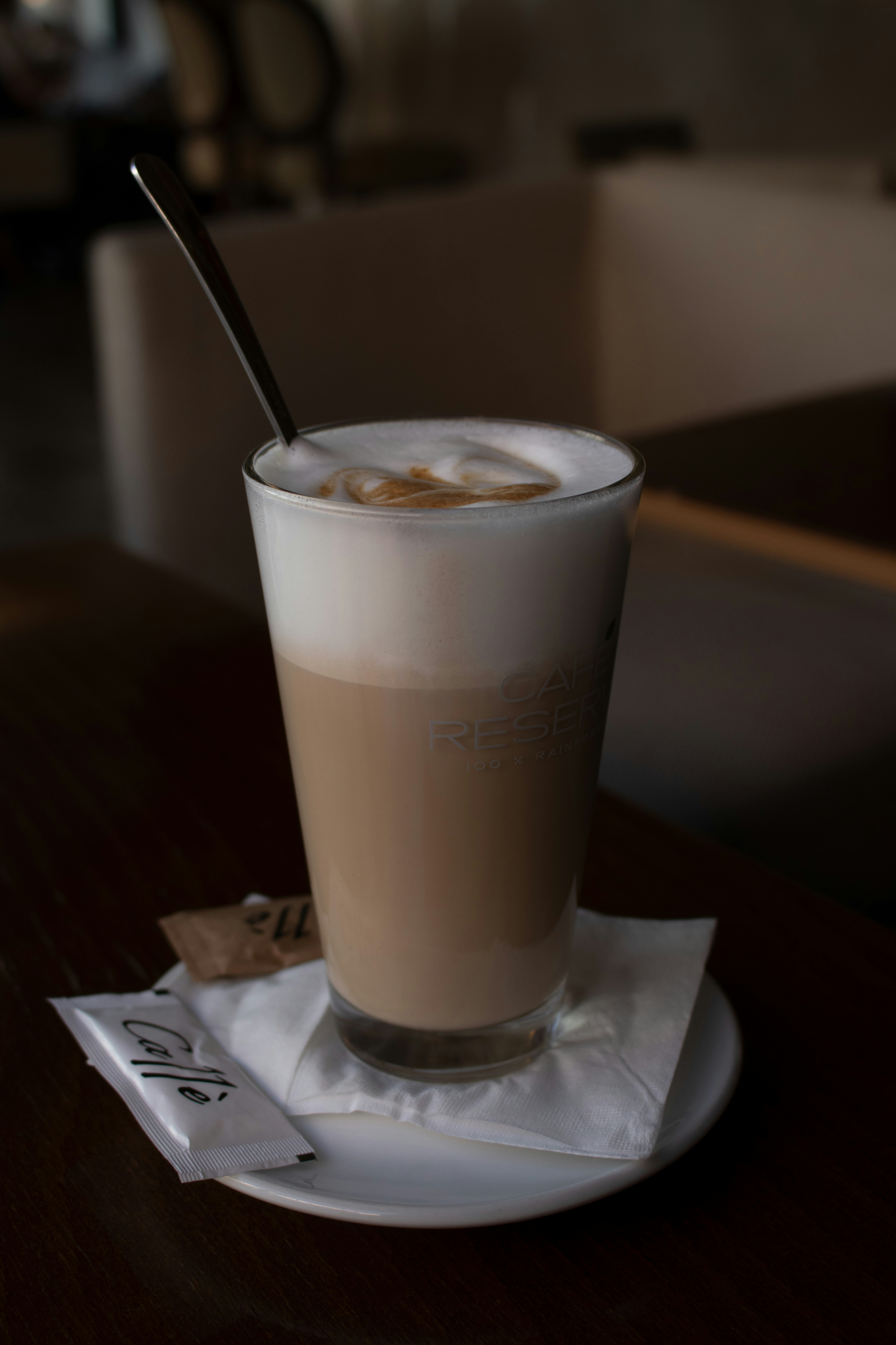 clear drinking glass with brown liquid